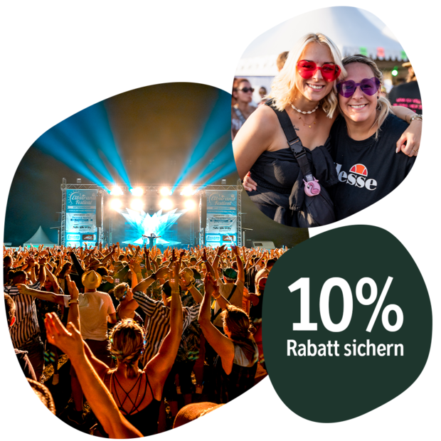 Große Menschenmenge bei Krombacher Festivalsommer am Elbstrand Festival mit Bühne und Beleuchtung