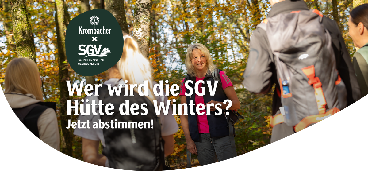 Gruppe von Wanderern im Wald mit dem Titel "wer wir die Hütte der Saison des SGVs"